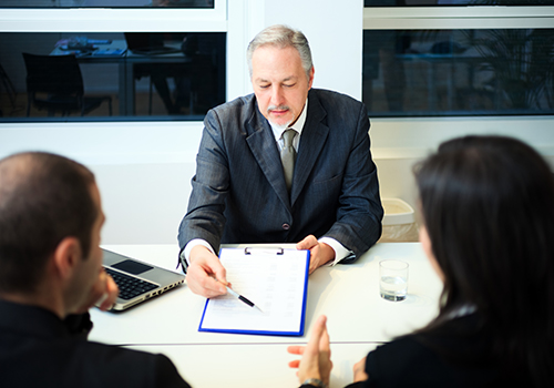 life insurance salesperson with couple