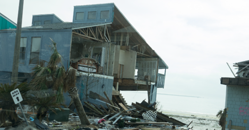 Hurricane Deductible Beach House Damage waterfront home missing side walls and roof from storm damage