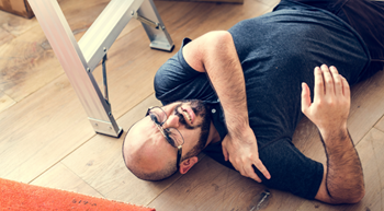 Liability Injured man on floor next to ladder