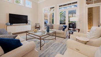 Personal Property Living room scene with furniture and television