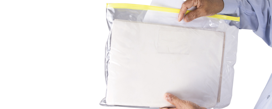 Documents stored in a waterproof plastic zipper bag