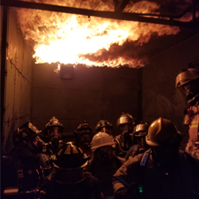 firefighters with live fire in training