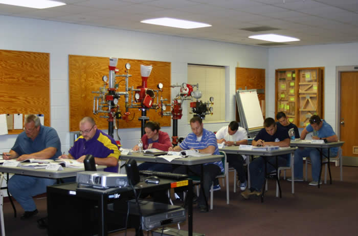 Students in classroom taking an exam